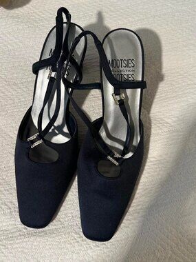 Navy blue kitten heels with silver buckle detail